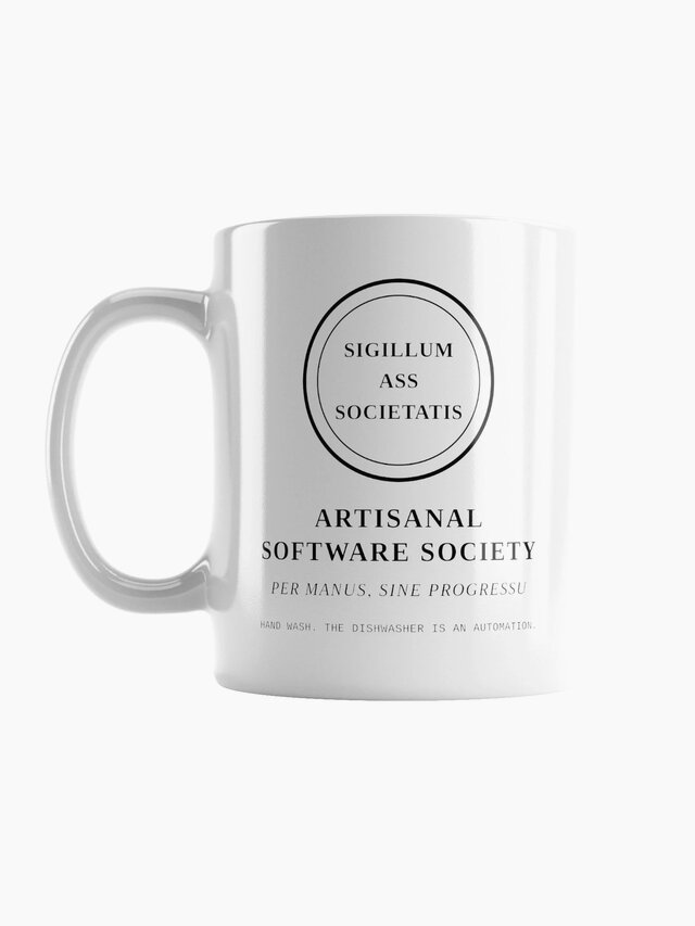 Photograph of the white mug bearing the Society seal and motto.
